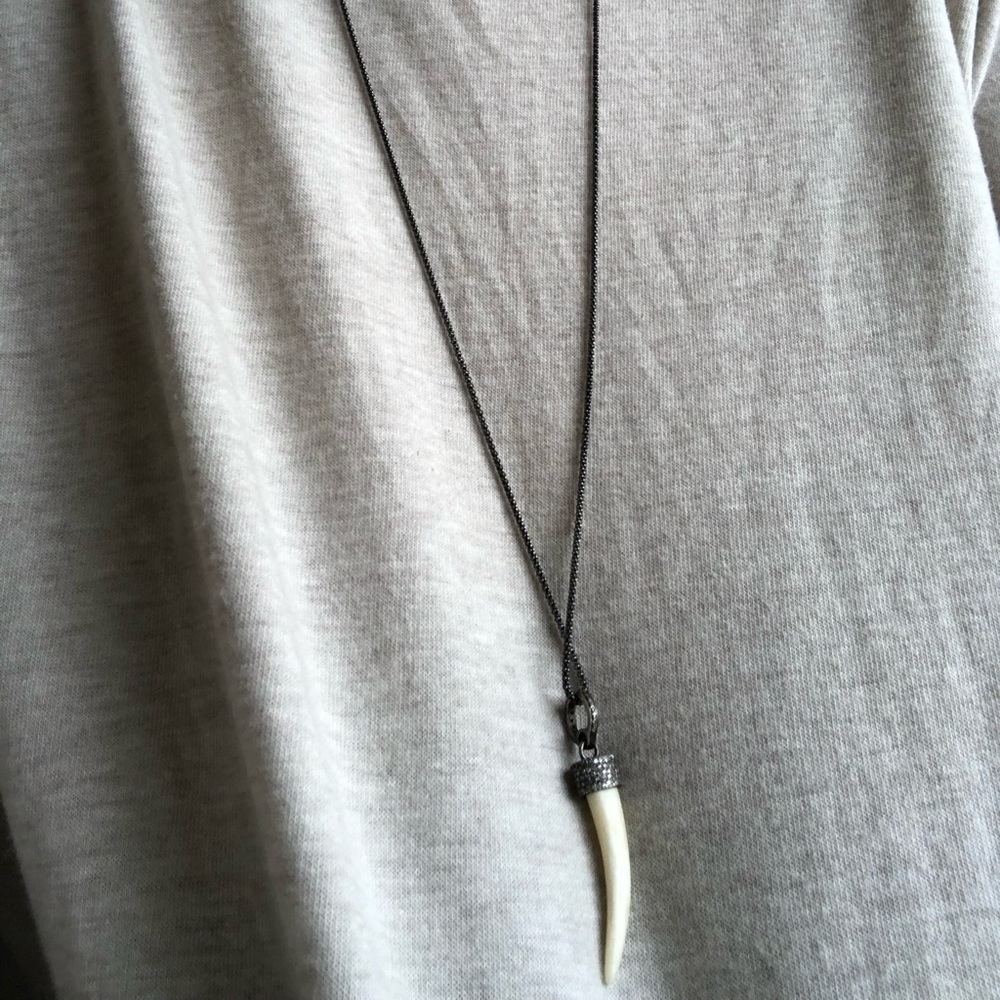 black necklace with pave diamond horn charm